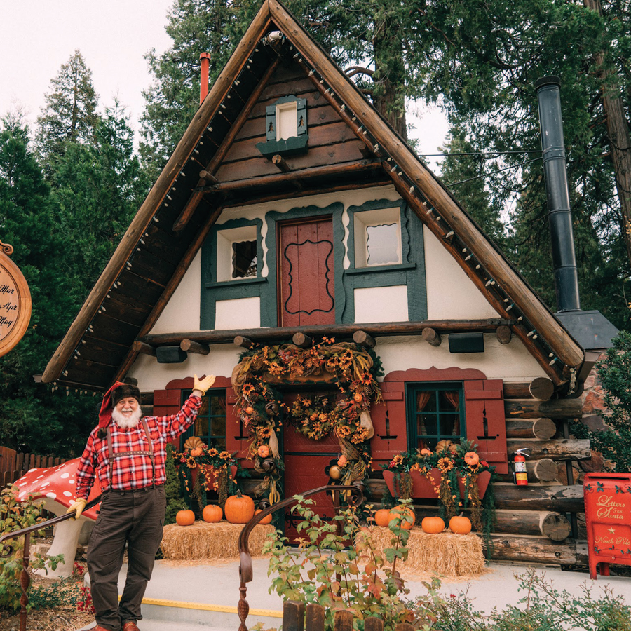 Fall1 A village cottage decorated with pumpkins in the fall